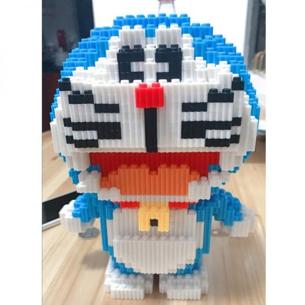 HCP 8802 Anime Doraemon Blue Cat Robot Stand Cute Animal Pet Model DIY Mini Magic Blocks 1 - LOZ™ MINI BLOCKS