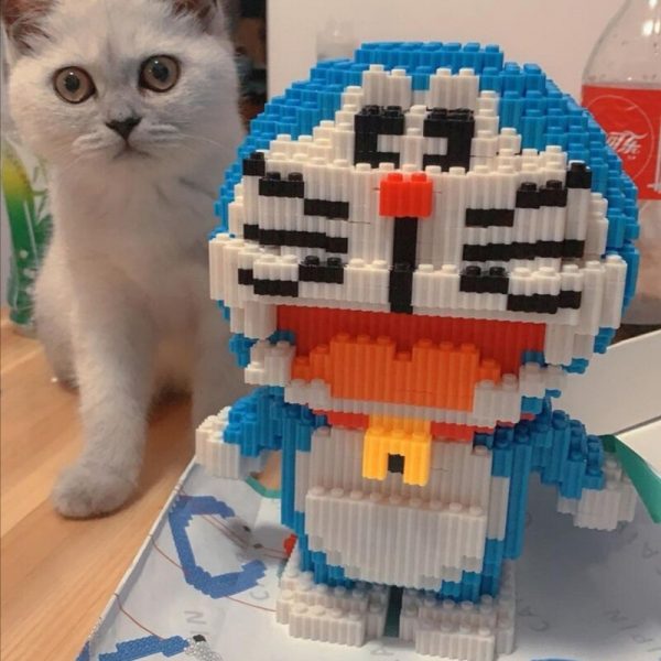 HCP 8802 Anime Doraemon Blue Cat Robot Stand Cute Animal Pet Model DIY Mini Magic Blocks 2 - LOZ™ MINI BLOCKS