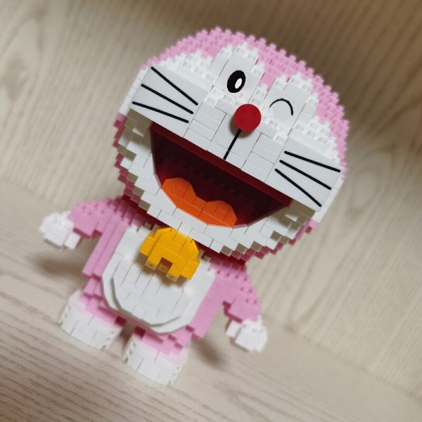 LP 200562 Anime Pink Doraemon Cat Stand Animal Robot 3D Model DIY Mini Diamond Blocks Bricks 3 - LOZ™ MINI BLOCKS