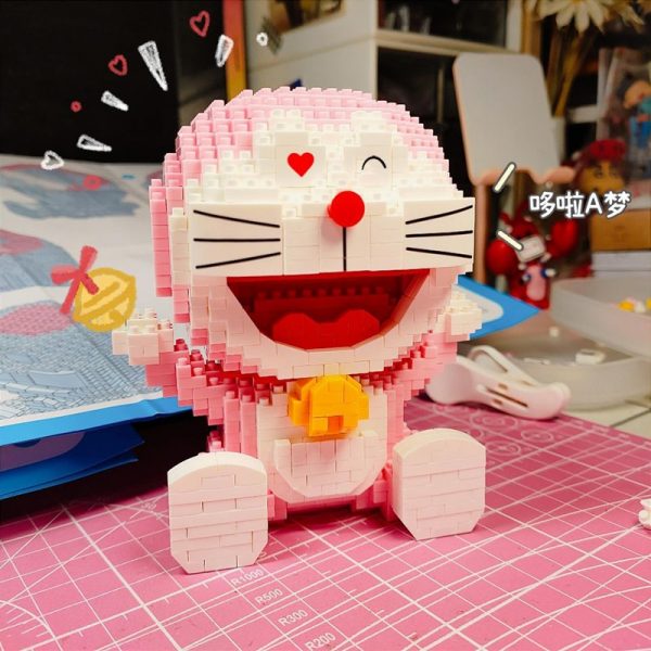 LP 200563 Anime Pink Doraemon Cat Sit Animal Robot Pet 3D Model DIY Mini Diamond Blocks 1 - LOZ™ MINI BLOCKS