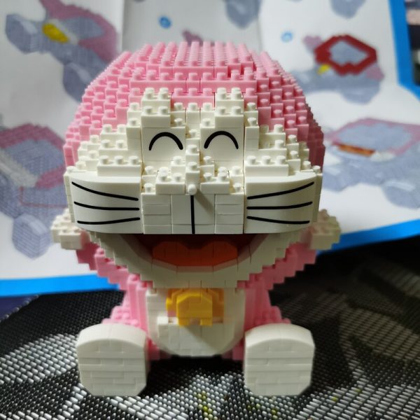 LP 200563 Anime Pink Doraemon Cat Sit Animal Robot Pet 3D Model DIY Mini Diamond Blocks 3 - LOZ™ MINI BLOCKS